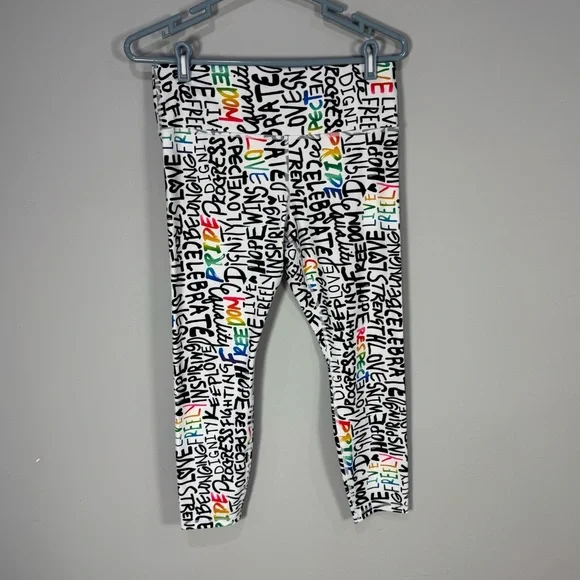 NWOT ATHLETA ELATION TRAIN 7/8
Tight Leggings PRIDE Graffiti words L - Picture 2 of 13
